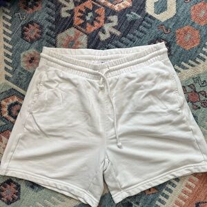 TNA aritzia long sweat shorts